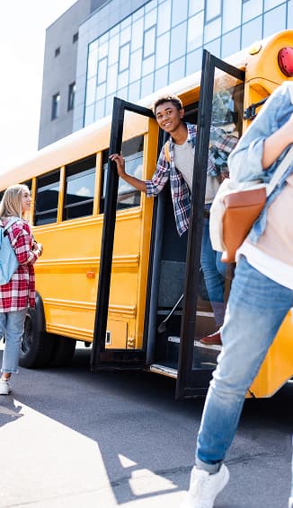 students and school bus
